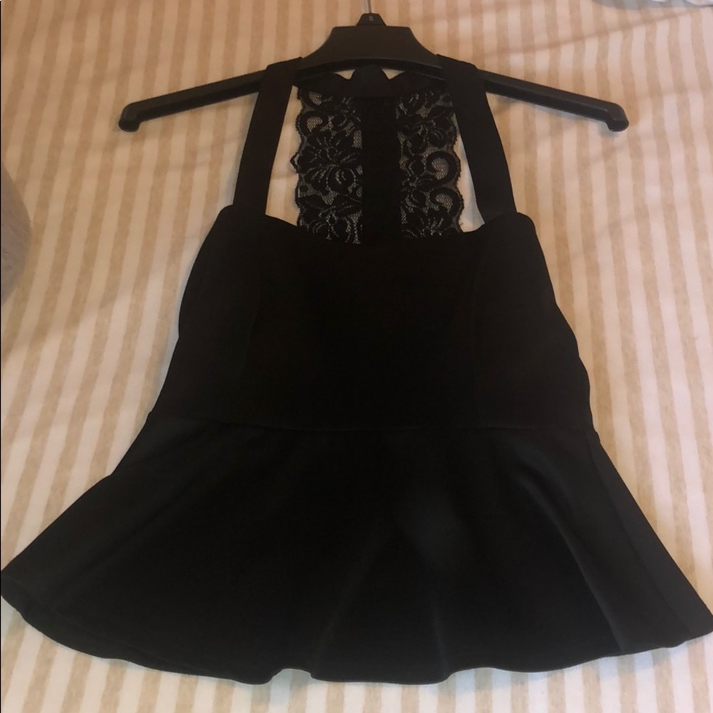 Black peplum top with lace back size M
